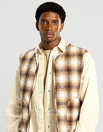 Lando’s plaid vest on All American Homecoming