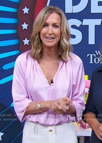 Lara's pink blouse and white button front skirt on Good Morning America