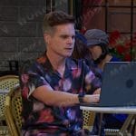 Leo’s black floral print shirt on Days of our Lives