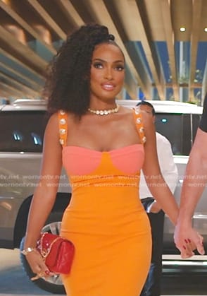 Lesa’s orange colorblock maxi dress on The Real Housewives of Dubai