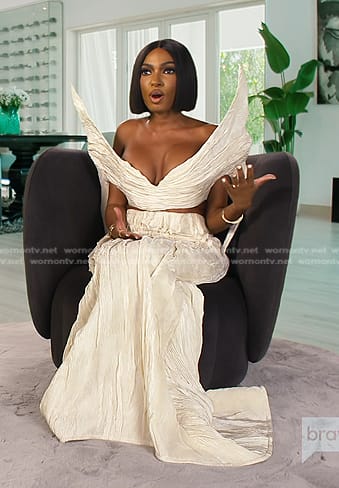 Lesa's white confessional top and skirt on The Real Housewives of Dubai