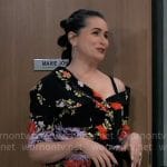 Lois’ black floral print off-shoulder jacket on General Hospital