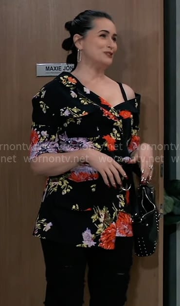 Lois' black floral print off-shoulder jacket on General Hospital