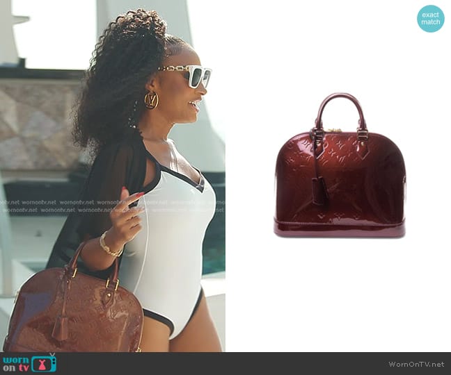 Louis Vuitton  Alma PM Vernis Leather Top Handle Bag in Rouge worn by Lesa Milan (Lesa Milan) on The Real Housewives of Dubai