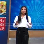 Morgan’s black wide-leg pants with white stitching on Good Morning America