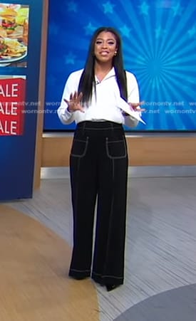 Morgan's black wide-leg pants with white stitching on Good Morning America