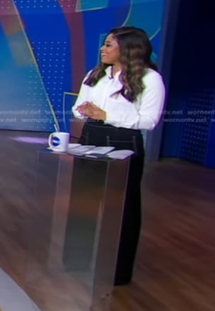 Morgan's black wide-leg pants with white stitching on Good Morning America