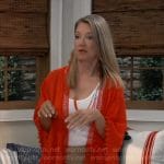 Nina’s red pom-pom trim cardigan on General Hospital