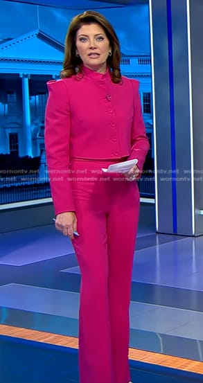 Norah’s fuchsia cropped jacket and pants on CBS Evening News