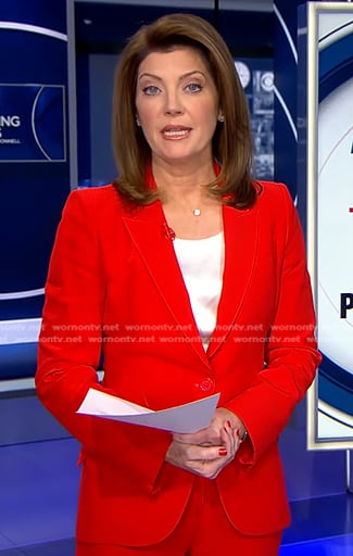 Norah's red suit on CBS Evening News