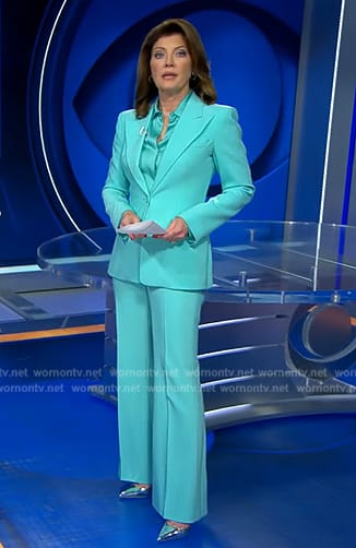 Norah's light blue suit and satin blouse on CBS Evening News