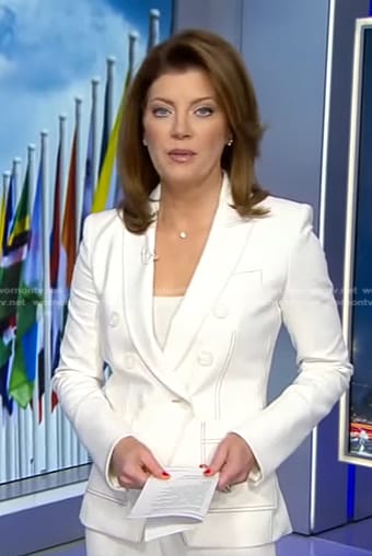 Norah’s white blazer with contrast stitching on CBS Evening News