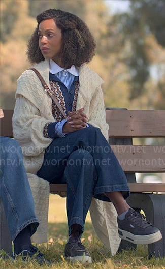 Paige's blue striped shirt and long cable knit cardigan on UnPrisoned