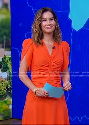 Rebecca Jarvis's orange ruched front dress on Good Morning America