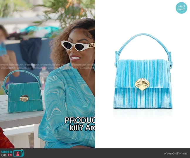 Rixo Jemima Tie Dye Velvet Bag in Blue worn by Caroline Brooks (Caroline Brooks) on The Real Housewives of Dubai