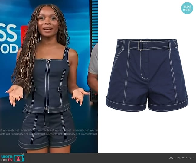 Simkhai Lourie Belted Denim Shorts in Midnight worn by Zuri Hall on Access Hollywood