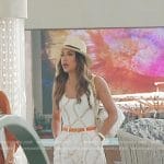 Taleen’s white chain print swimsuit and pants on The Real Housewives of Dubai