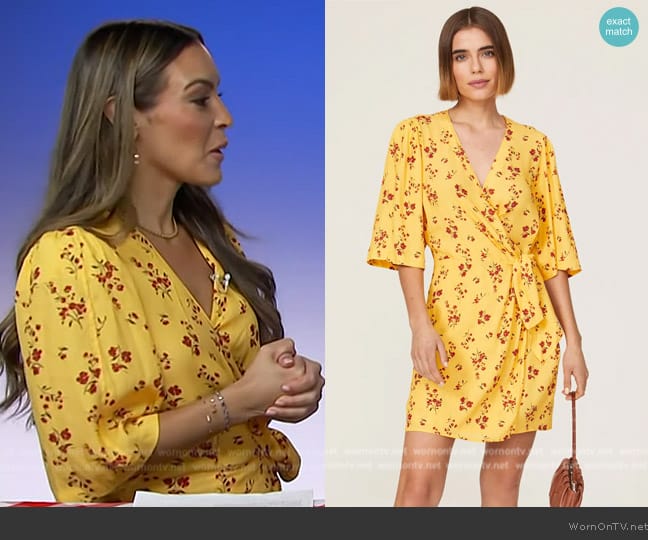 Thakoon Collective Yellow Floral Wrap Dress worn by Emily Orozco on Access Hollywood