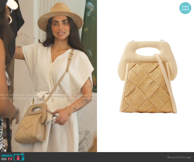 THEMOIRè Clori Woven Straw Top-Handle Bag worn by Sara Al Madani (Sara Al Madani) on The Real Housewives of Dubai