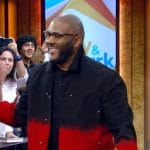 Tyler Perry’s black and red dip dye denim jacket on Live with Kelly and Mark