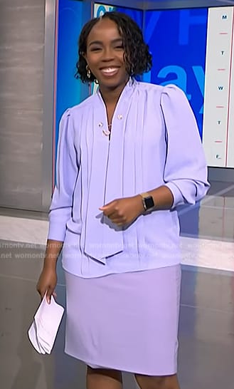 Zinhle’s lavender tie neck blouse on NBC News Daily