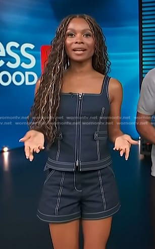 Zuri's navy contrast stitching top and shorts on Access Hollywood