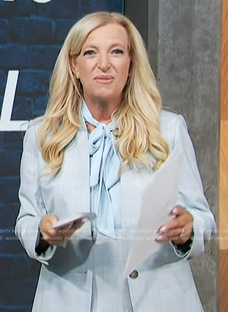 Alison Triessl’s blue windowpane blazer and skirt on Access Hollywood