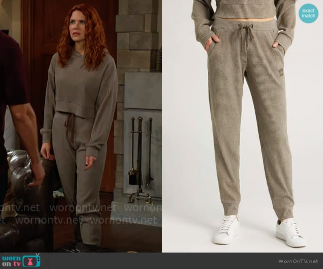 Alo Yoga Muse High Waist Rib Joggers in Olive Tree Heather worn by Sally Spectra (Courtney Hope) on The Young and the Restless