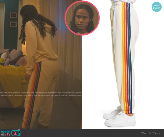 Aviator Nation Stripe Sweatpants in Vintage White/ Rainbow worn by Shanelle Tucker (Shannon Kane) on Reasonable Doubt