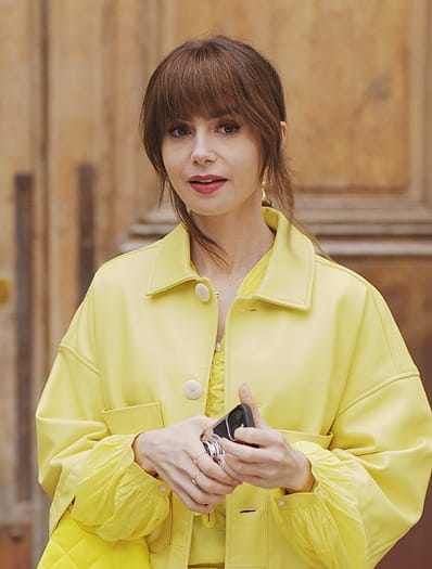 Emily's yellow ruffle blouse and jacket on Emily in Paris