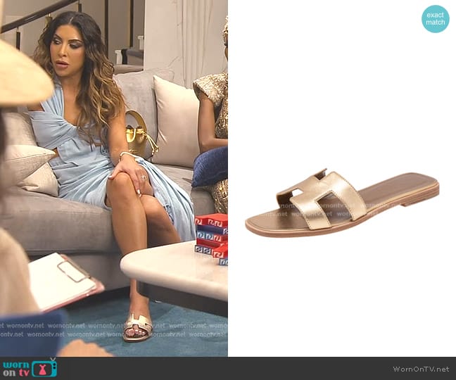 Hermes Leather Oran Flat Sandals in Gold worn by Taleen Marie (Taleen Marie) on The Real Housewives of Dubai