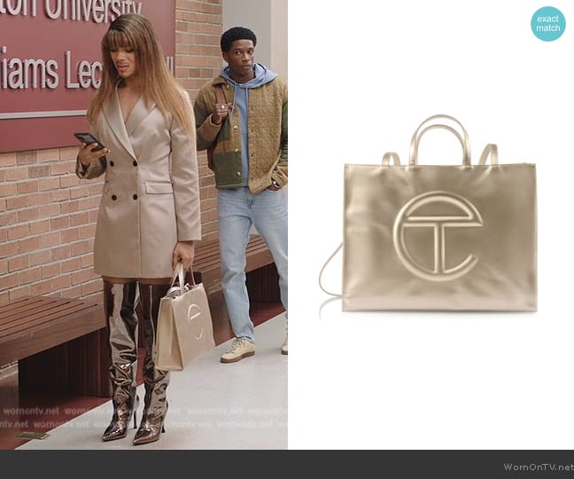 Telfar Large Shopping Bag in Gold worn by Nathanial Hardin (Rhoyle Ivy King) on All American Homecoming