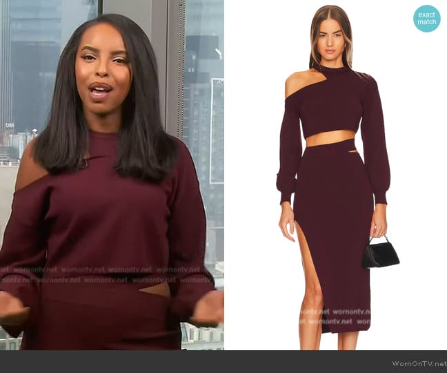 Mona’s burgundy cutout skirt on Extra