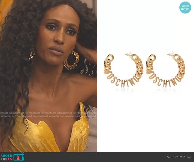 Moschino Logo Lettering Hoop Earrings worn by Chanel Ayan (Chanel Ayan) on The Real Housewives of Dubai