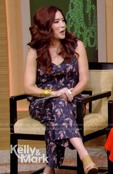 Amy E. Goodman’s navy floral jumpsuit on on Live with Kelly and Mark