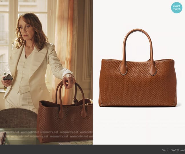 Aspinal of London London Woven Leather Tote Bag worn by Sylvie (Philippine Leroy-Beaulieu) on Emily in Paris