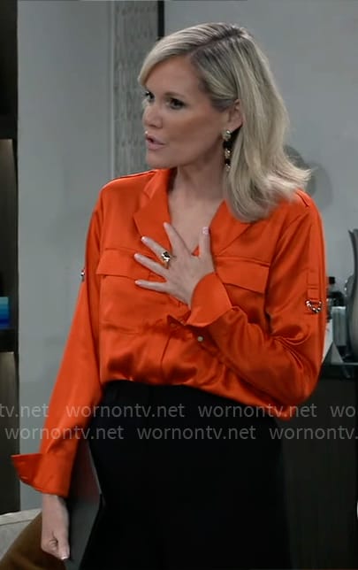 Ava's orange satin shirt with ring details on General Hospital