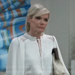 Ava’s white blouse with lace cutout shoulders on General Hospital