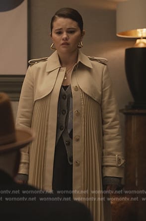 Mabel's pleated trench coat and cardigan on Only Murders in the Building