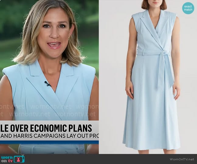 Calvin Klein Belted Peak Lapel Wrap Midi Dress in Breeze worn by Caitlin Huey-Burns on CBS Mornings