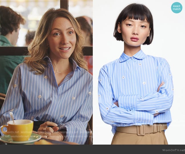 Carolina Herrera Striped Poplin Shirt swith Sequins worn by Élise (Anaïs Weill) on Emily in Paris