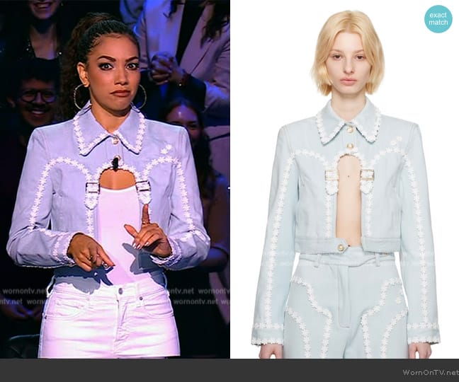 Corinne’s blue cutout denim jacket on Beat Shazam