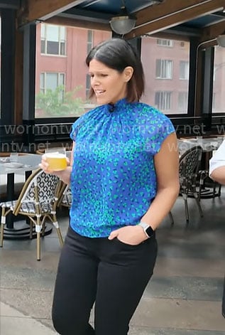 Dana Jacobson's blue and green floral top on CBS Saturday Morning
