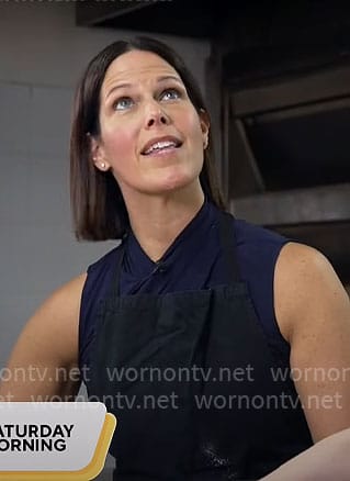 Dana Jacobson’s navy sleeveless cross neck top on CBS Mornings