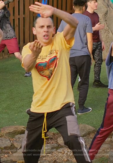 Eli’syellow Californinia graphic tee on Cobra Kai