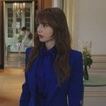 Emily’s blue satin tie neck blouse and suit on Emily in Paris