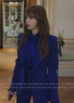 Emily’s blue satin tie neck blouse and suit on Emily in Paris