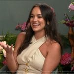 Emily Curl’s beige button front dress on E! News