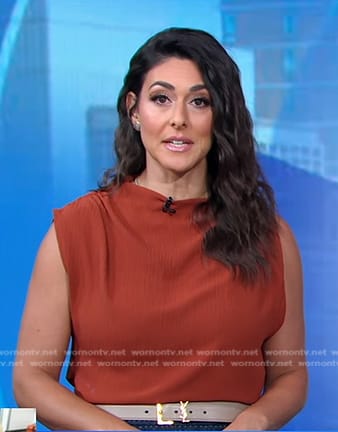 Erielle's brown asymmetric top and belt on Good Morning America