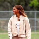 Gabby Thomas’s beige varsity jacket on NBC News Daily